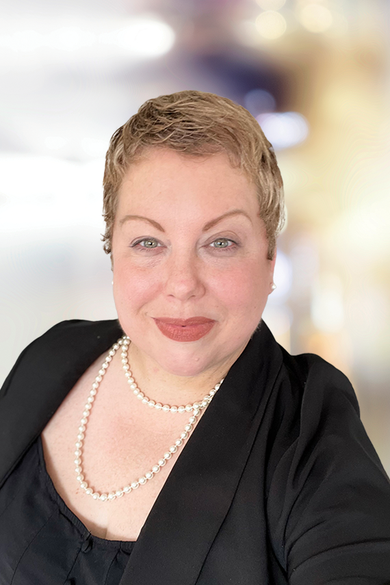 Portrait of Jessica Benbow, Director of Marketing.